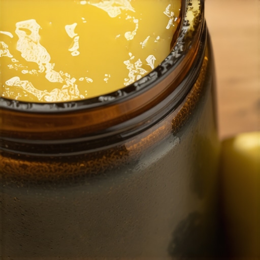 Close-up of organic beef tallow in a jar, highlighting its rich texture and golden color.