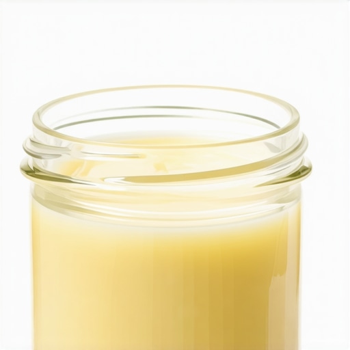 Close-up of a jar of grass-fed tallow showcasing its rich, natural texture.